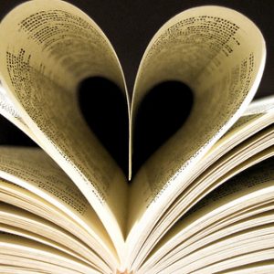 Book pages forming a heart image