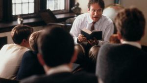 Man Reading to Others