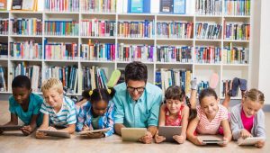 Students Teacher Reading Tablet